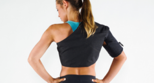 A person wearing the Squid Go back cold compression wrap