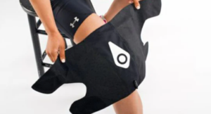 A person wearing the Squid Go knee cold compression system